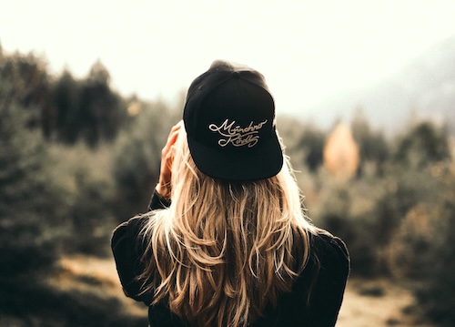 Image of the back of a woman's head, client review of hypnotherapy with Rowenna